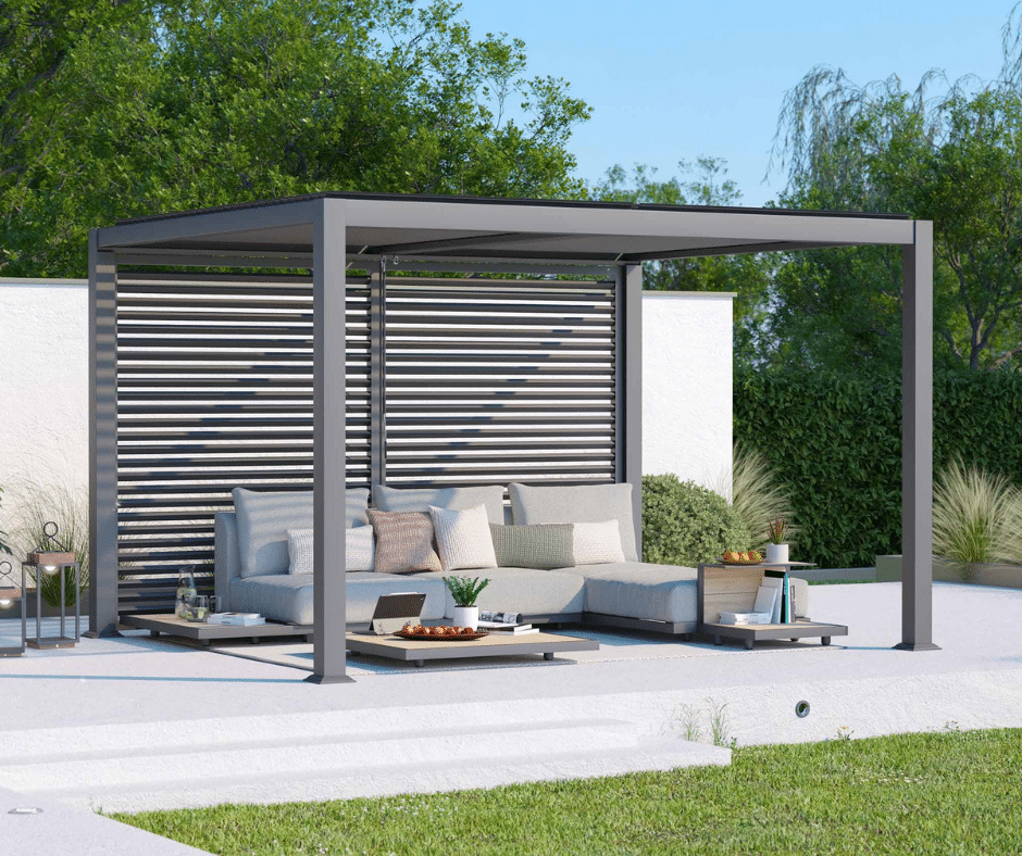 Modern outdoor pergola with louvered roof and cozy seating area on a patio.